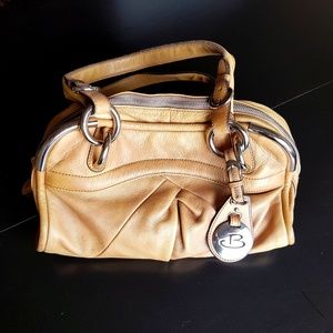 B. Makoswky Tan Genuine Lambskin purse